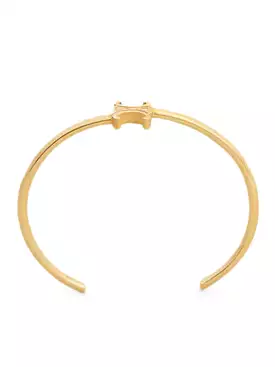 TRIOMPHE ASYMMETRIC RIGID BRACELET IN BRASS GOLD FINISH